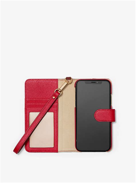 michael kors i phone xr wallet cases|Saffiano Leather Wristlet Folio Case for iPhone XR .